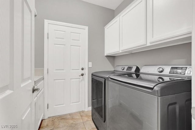 7806 Sundial Peak St, Las Vegas, NV 89166 - laundry area featuring independent washer and dryer and cabinet space