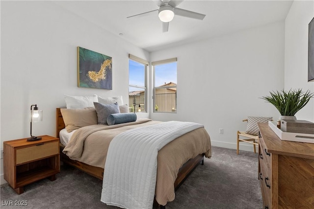 bedroom with baseboards, a ceiling fan, and carpet flooring