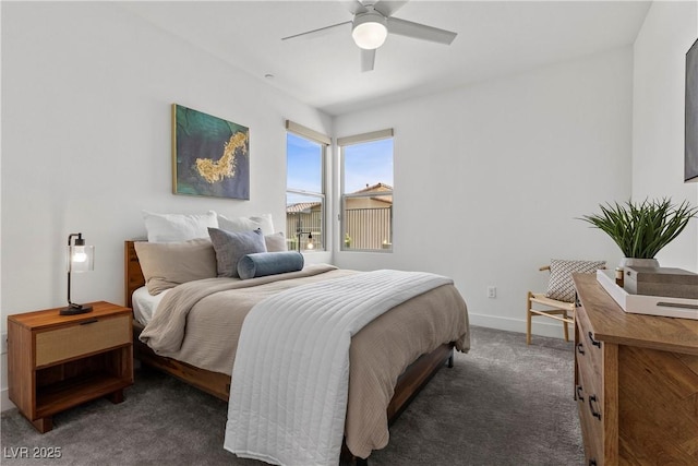 carpeted bedroom with baseboards and a ceiling fan