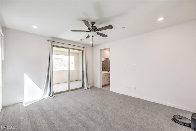 interior space featuring ceiling fan, light carpet, and recessed lighting