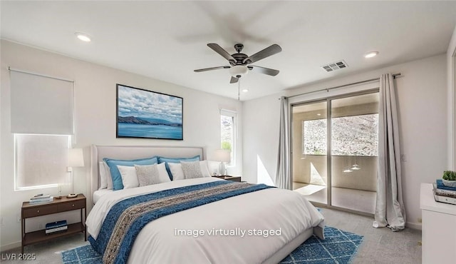 carpeted bedroom featuring recessed lighting, baseboards, visible vents, and access to exterior