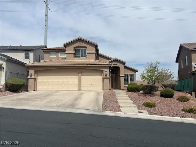 view of front facade with driveway and stucco siding