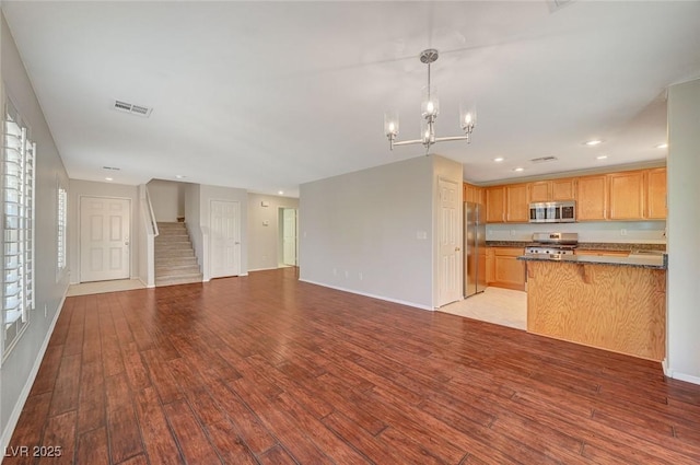 unfurnished living room with visible vents, light wood-style flooring, recessed lighting, and baseboards