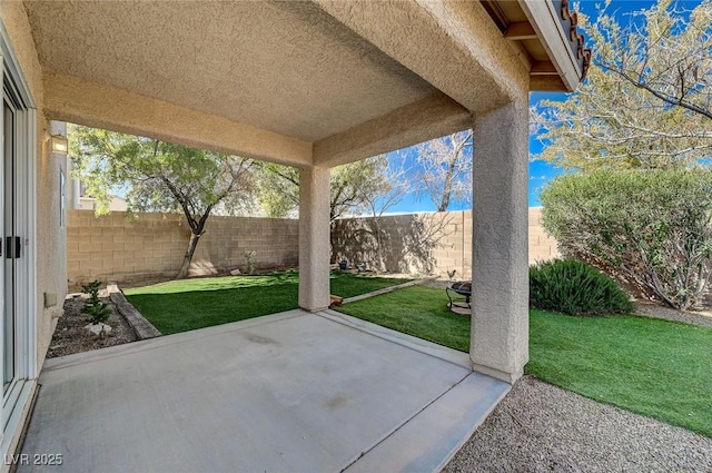 view of patio featuring a fenced backyard