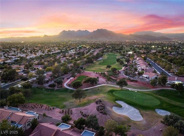 bird's eye view featuring view of golf course, a residential view, and a mountain view
