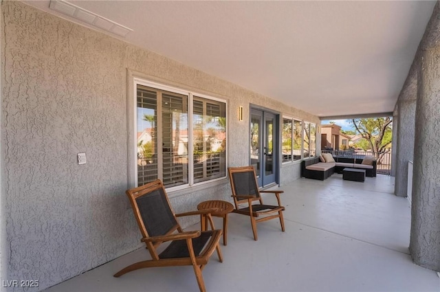 view of patio / terrace with french doors and an outdoor hangout area