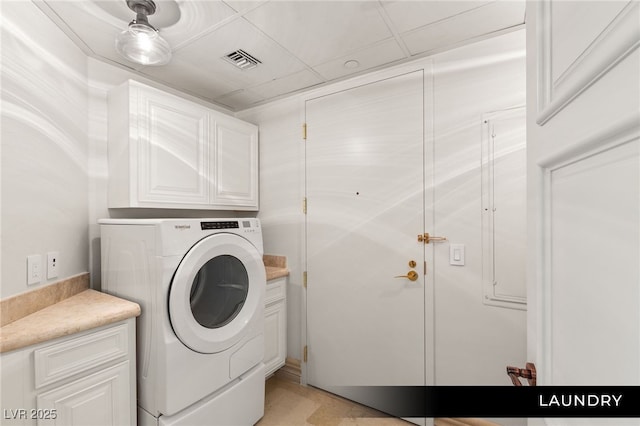 laundry area with cabinet space, visible vents, and washer / dryer