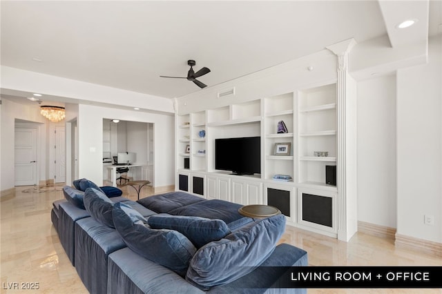 living room featuring built in features, baseboards, recessed lighting, and ceiling fan with notable chandelier