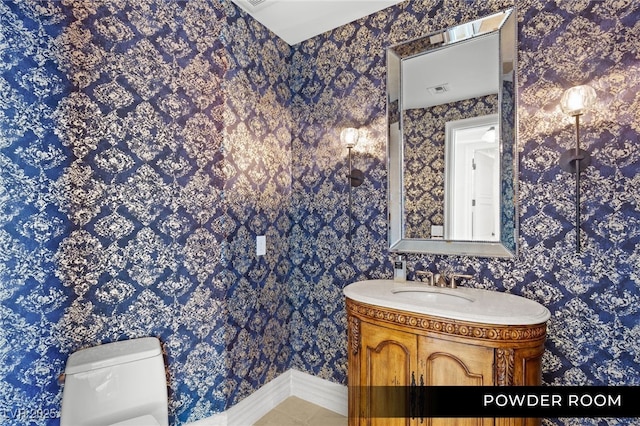bathroom featuring toilet, tile patterned floors, vanity, and visible vents