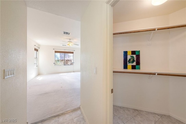 853 Ashford Way, Henderson, NV 89015 - hallway with tile patterned floors, carpet flooring, baseboards, and visible vents