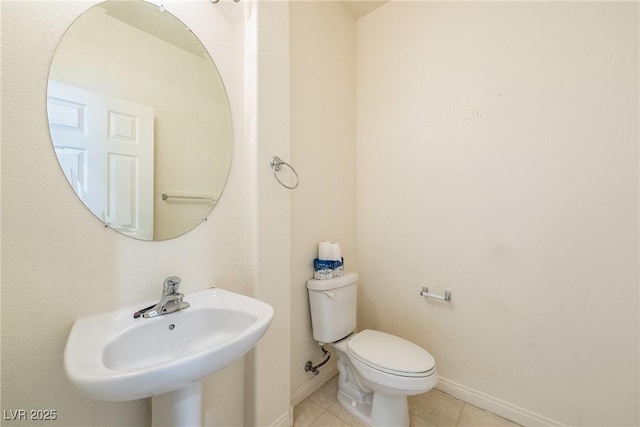 853 Ashford Way, Henderson, NV 89015 - bathroom with toilet, a sink, tile patterned flooring, and baseboards