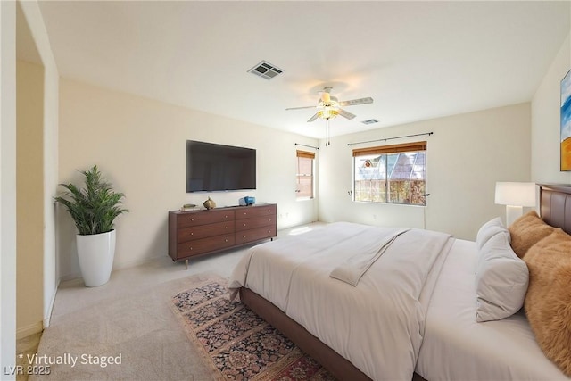 853 Ashford Way, Henderson, NV 89015 - bedroom featuring visible vents, a ceiling fan, and light colored carpet