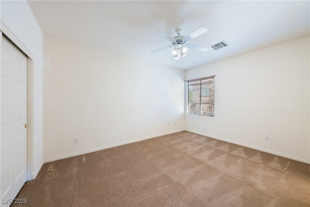 853 Ashford Way, Henderson, NV 89015 - unfurnished room featuring carpet, visible vents, baseboards, and a ceiling fan