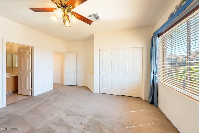 853 Ashford Way, Henderson, NV 89015 - unfurnished bedroom with a closet, ensuite bath, a ceiling fan, carpet floors, and visible vents