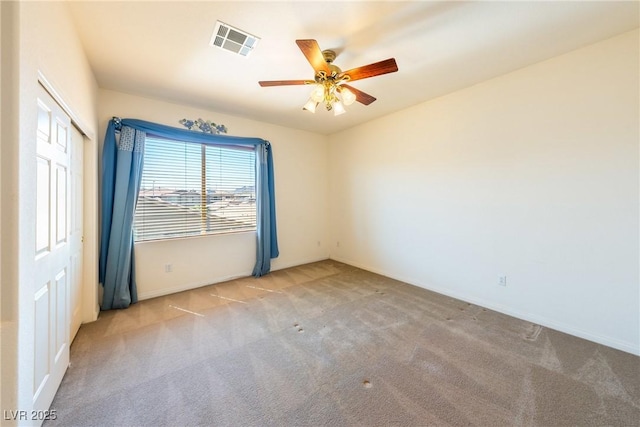 853 Ashford Way, Henderson, NV 89015 - empty room with visible vents, baseboards, a ceiling fan, and carpet floors