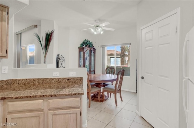 6480 Annie Oakley Dr Unit 511, Las Vegas, NV 89120 - dining room featuring baseboards, light tile patterned flooring, and ceiling fan
