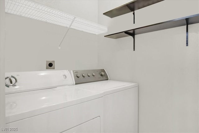 6480 Annie Oakley Dr Unit 511, Las Vegas, NV 89120 - washroom featuring washer and clothes dryer and laundry area