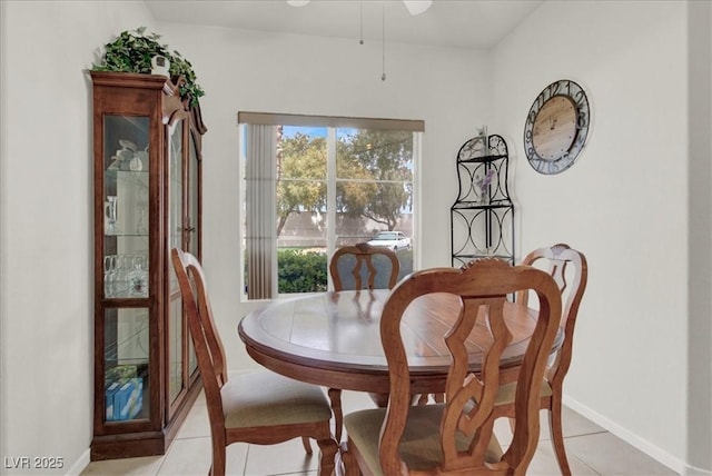 6480 Annie Oakley Dr Unit 511, Las Vegas, NV 89120 - dining room featuring light tile patterned floors, baseboards, and ceiling fan