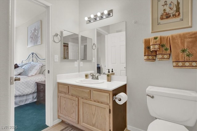 6480 Annie Oakley Dr Unit 511, Las Vegas, NV 89120 - ensuite bathroom featuring ensuite bath, vanity, baseboards, and toilet