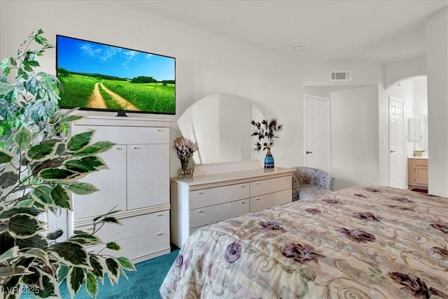 6480 Annie Oakley Dr Unit 511, Las Vegas, NV 89120 - carpeted bedroom with visible vents and arched walkways