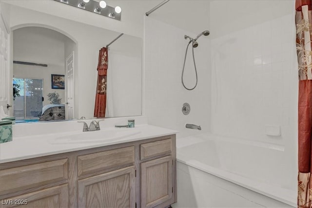 6480 Annie Oakley Dr Unit 511, Las Vegas, NV 89120 - ensuite bathroom with shower / bath combo with shower curtain, vanity, and connected bathroom