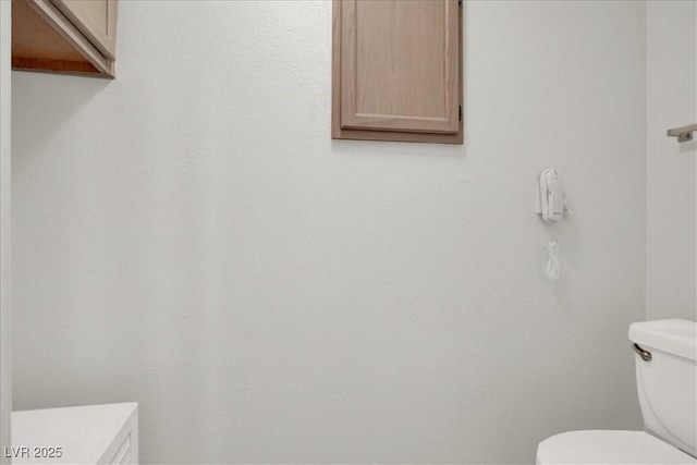 6480 Annie Oakley Dr Unit 511, Las Vegas, NV 89120 - half bathroom featuring toilet