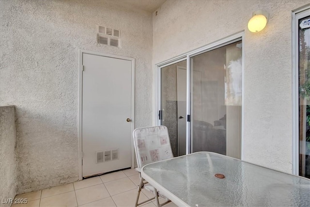 6480 Annie Oakley Dr Unit 511, Las Vegas, NV 89120 - dining area with a textured wall, tile patterned floors, and visible vents