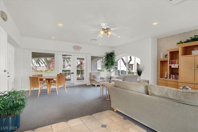 6480 Annie Oakley Dr Unit 511, Las Vegas, NV 89120 - living area with visible vents, ceiling fan, recessed lighting, french doors, and light colored carpet