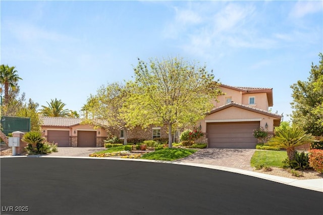 2285 Villefort Ct, Las Vegas, NV 89117 - view of front of house with stucco siding, a tile roof, an attached garage, and driveway