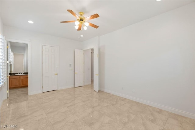 2285 Villefort Ct, Las Vegas, NV 89117 - unfurnished bedroom featuring baseboards, recessed lighting, ceiling fan, ensuite bath, and a sink