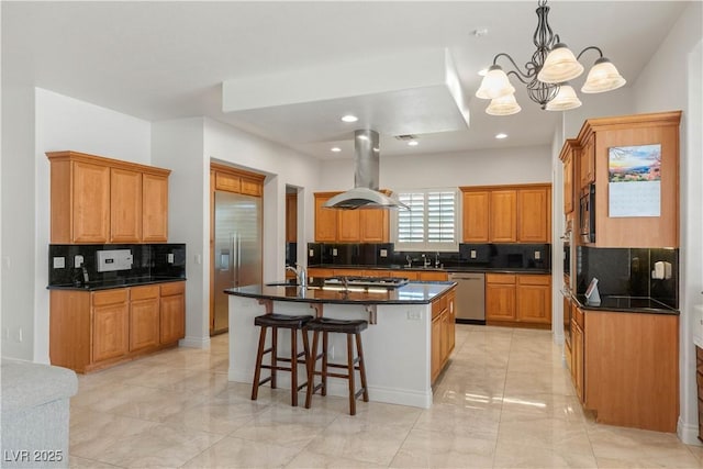 2285 Villefort Ct, Las Vegas, NV 89117 - kitchen with island range hood, stainless steel appliances, light marble finish floors, backsplash, and a center island with sink