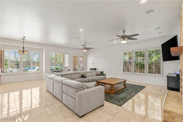 2285 Villefort Ct, Las Vegas, NV 89117 - living area with plenty of natural light, light tile patterned flooring, a ceiling fan, recessed lighting, and a chandelier