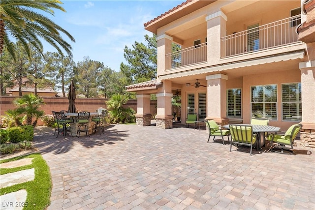 2285 Villefort Ct, Las Vegas, NV 89117 - view of patio featuring outdoor dining area, a balcony, and ceiling fan