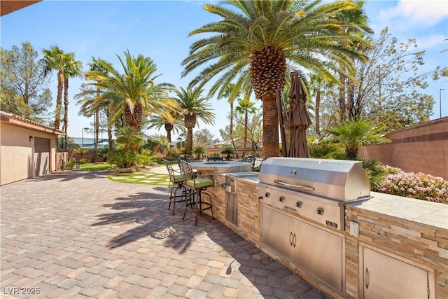 2285 Villefort Ct, Las Vegas, NV 89117 - view of patio featuring a garage