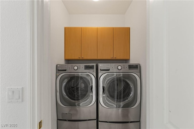 2285 Villefort Ct, Las Vegas, NV 89117 - washroom with cabinet space and washing machine and clothes dryer