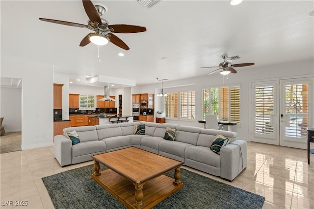 2285 Villefort Ct, Las Vegas, NV 89117 - living area with ceiling fan, light tile patterned flooring, recessed lighting, and baseboards