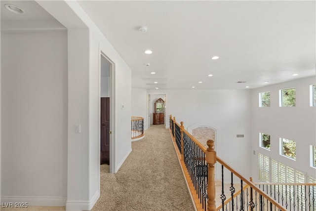 2285 Villefort Ct, Las Vegas, NV 89117 - hall with an upstairs landing, recessed lighting, light colored carpet, and baseboards