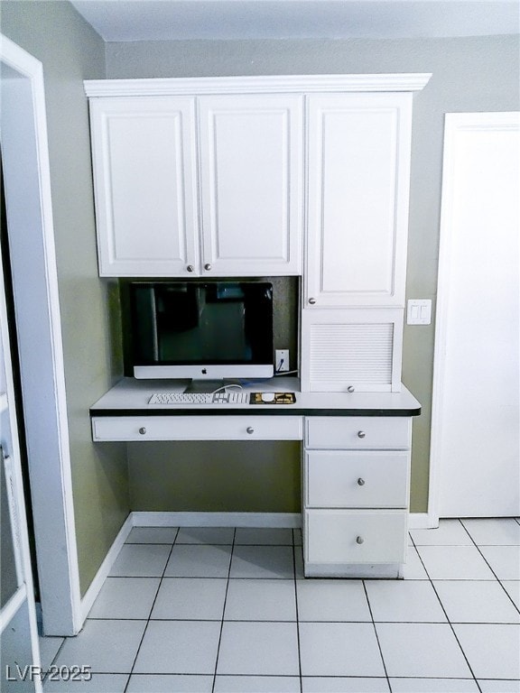 interior space with baseboards