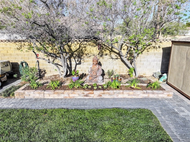 view of yard featuring fence
