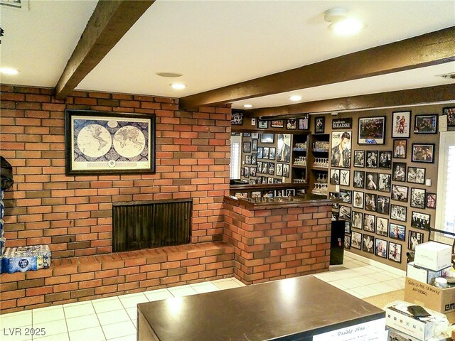interior space featuring recessed lighting, beamed ceiling, and tile patterned flooring