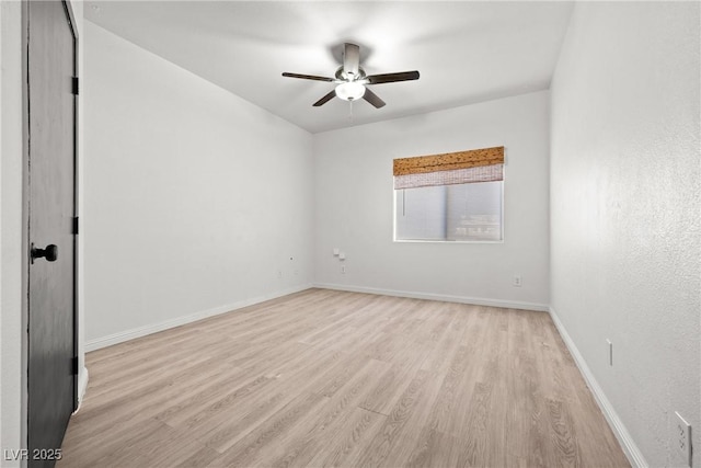 5751 Hacienda Ave Unit 135, Las Vegas, NV 89122 - unfurnished room with light wood-type flooring, ceiling fan, and baseboards