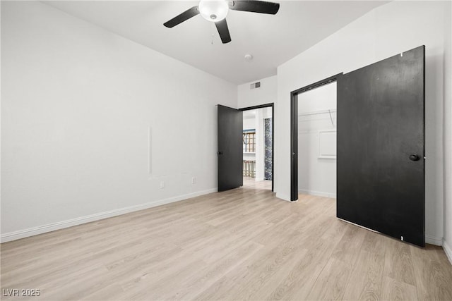5751 Hacienda Ave Unit 135, Las Vegas, NV 89122 - unfurnished bedroom featuring light wood-style flooring, a closet, a ceiling fan, and baseboards
