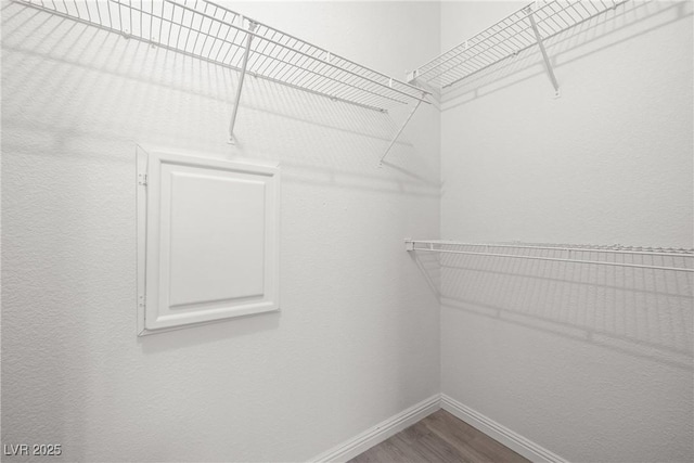 5751 Hacienda Ave Unit 135, Las Vegas, NV 89122 - spacious closet featuring wood finished floors