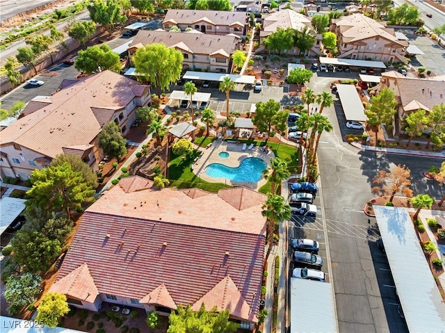 5751 Hacienda Ave Unit 135, Las Vegas, NV 89122 - aerial perspective of suburban area with a pool