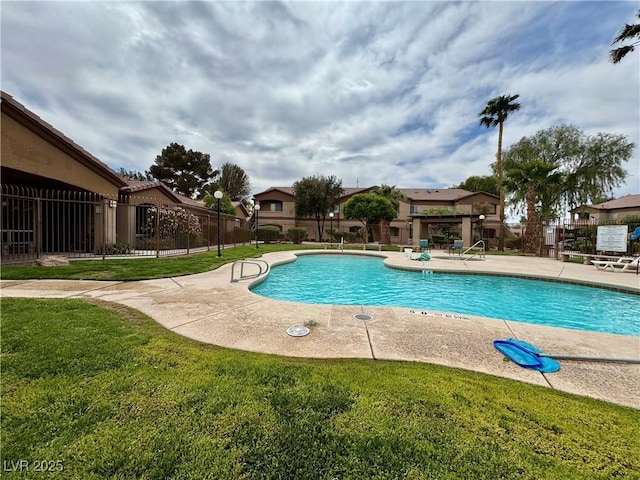 5751 Hacienda Ave Unit 135, Las Vegas, NV 89122 - community pool featuring a patio