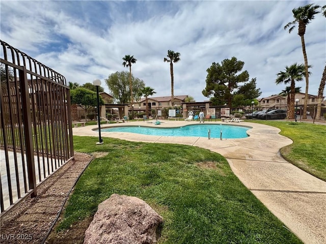 5751 Hacienda Ave Unit 135, Las Vegas, NV 89122 - community pool featuring a patio area