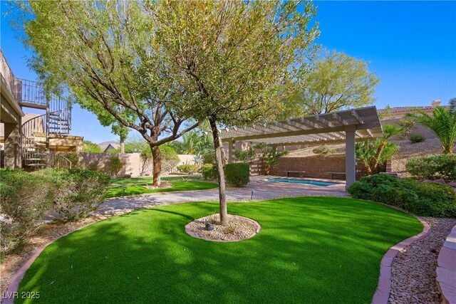 view of yard with a fenced backyard, a pergola, stairs, and a fenced in pool