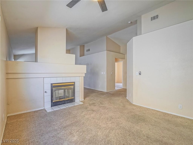 218 Pretty Sunset Ter, Henderson, NV 89015 - unfurnished living room with visible vents, baseboards, ceiling fan, carpet flooring, and a tile fireplace