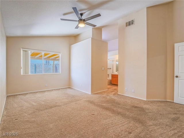 218 Pretty Sunset Ter, Henderson, NV 89015 - carpeted empty room with ceiling fan, baseboards, vaulted ceiling, and visible vents