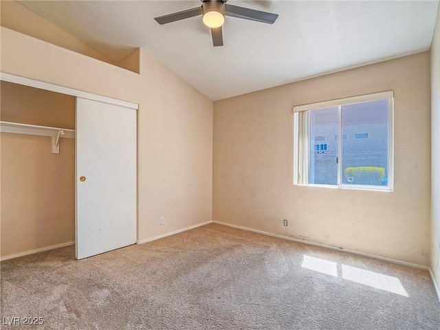 218 Pretty Sunset Ter, Henderson, NV 89015 - unfurnished bedroom with a closet, baseboards, vaulted ceiling, and carpet floors